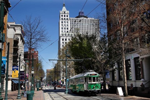 Nostalgic streetcar runs down South Main Street in Memphis, Memphis, Tennessee, USA