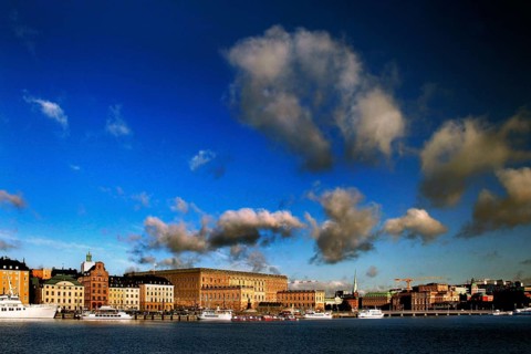 View of Stockholm harbor against an impressive blue sky with white clouds, Stockholm, Gamla Stan,