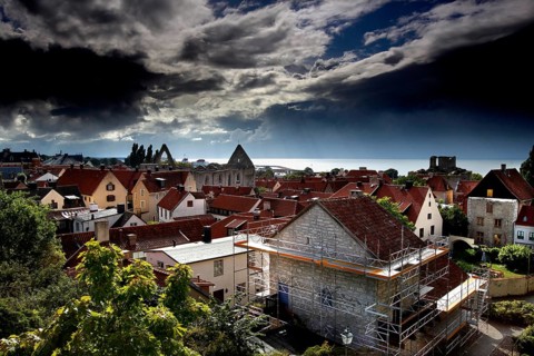 Clouds rolling over the red roofs of the historic old town, Visby, Gotland, Sweden
