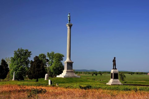 Several monuments stand in an open area of Gettysburg National Military Park, Gettysburg,
