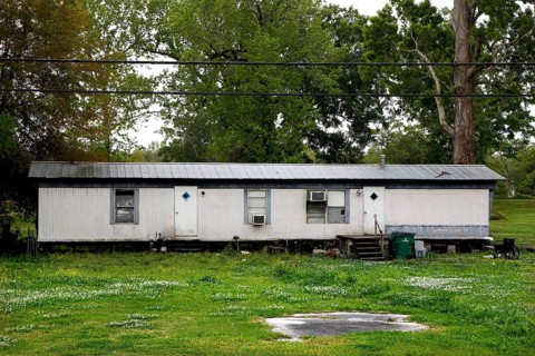 Simple caravan surrounded by green nature in Atchafalaya Basin, Atchafalaya Basin, Louisiana, USA