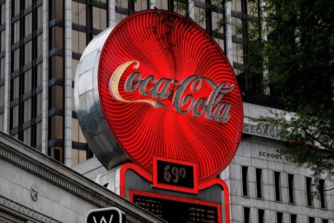 Bright red Coca-Cola advertising sign scores urban in central Atlanta, Atlanta, Georgia, USA