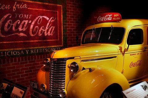 A retro yellow Coca-Cola car is presented nostalgically at the museum in Atlanta, Atlanta, Georgia,