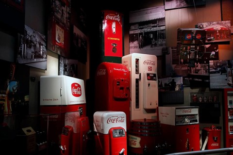 Old Coca-Cola vending machines in the exhibition area of the museum in Atlanta convey nostalgia,