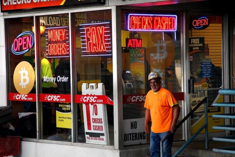 A store in downtown Atlanta illuminated with eye-catching neon signs and a Bitcoin presence,