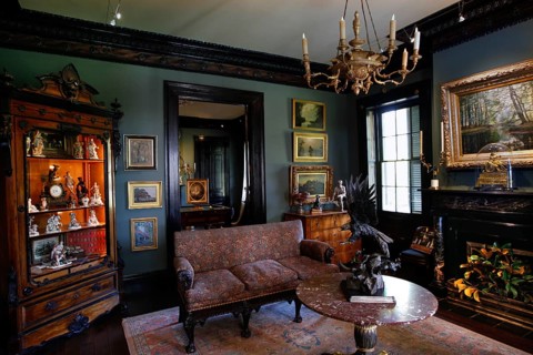 Elegant living room with antique furniture and paintings, zero