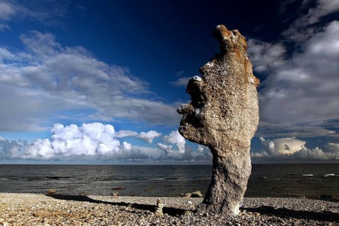 Single limestone column rises on the coast of Langhammars, Langhammars, Fårö, Sweden