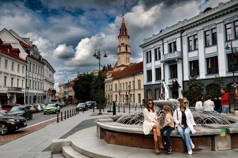 Bustling Town Hall Square, Rathausplatz, Rathausplatz in Vilnius with fountain and St. Nicholas