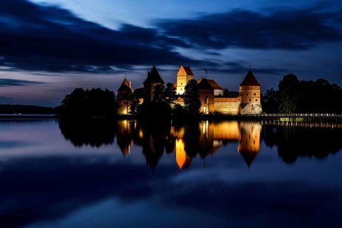 Atmospheric night view of Trakai Castle with reflection, Trakai, Vilniaus Apskritis, Lithuania