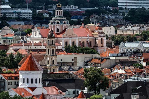 View of the old town of Vilnius with church towers and red roofs from the Three Crosses Hill,