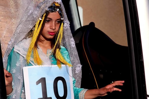 Participant in the Miss Voting at the Fête des Roses in traditional dress, El Kelâa m'Gouna,