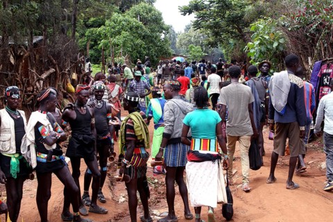 Busy market with people dressed in groups, Key Afar, Ethiopia
