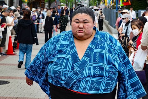 A Sumotori proud in traditional clothing in Ryogoku, Tokyo, Tokyo, Ryogoku, Japan