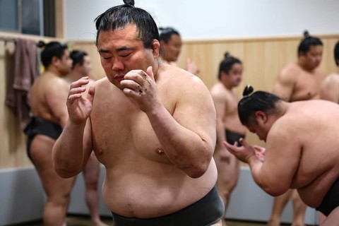 Sumo wrestler engaged in intensive training session at Sumo Center, Tokyo, Ryogoku, Japan