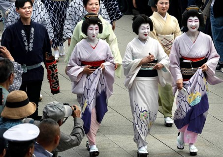 Geishas in traditional dress at the Daigyoretsu Parade at Senso-ji in Tokyo, Tokyo, Japan