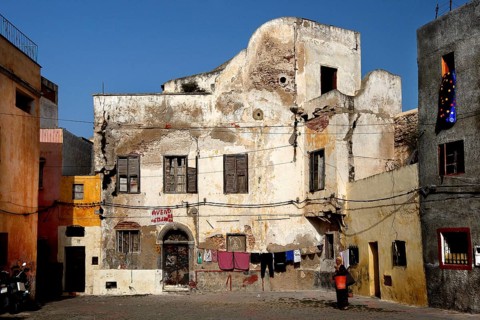 Weathered façade of an old building under a cloudless sky, El Jadida, Cité Portugaise, Morocco