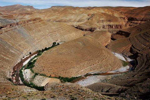 Impressive geological formations in the Dadès Canyon with a river, Dadès Gorge, Morocco