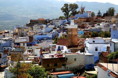 Panoramic view of the iconic blue town of Chefchaouen with surrounding mountains, Chefchaouen,