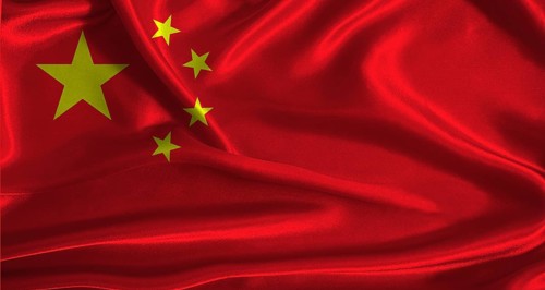 China flag with cloth textured background. National flag of China with realistic texture