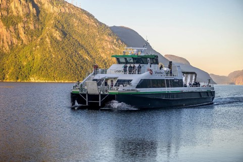 Large ferry operated by the Columbus shipping company sails through the Lysefjord with an