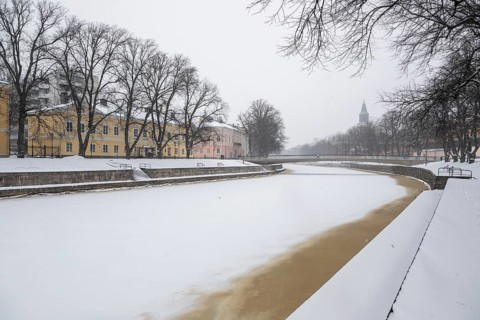 Aurajoki river frozen in winter, Dom, Turku or Swedish Åbo, Varsinais-Suomi, Finland