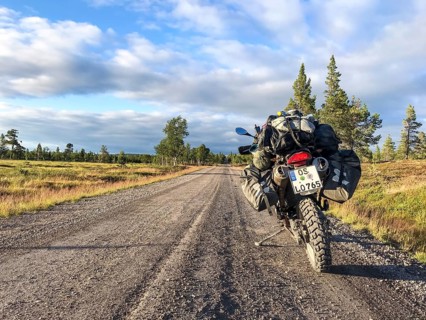 Idre, Dalarnas län, Sweden, BMW G 650 GS Sertao enduro motorcycle on a sunny road in the middle of