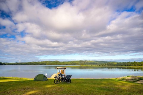 Rörström, Dorotea, Västerbotten, Sweden, picturesque seascape with tent and BMW G 650 GS Sertao