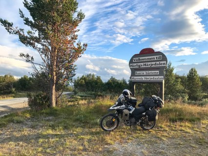 Funäsdalen, Jämtlands län, Sweden, Rural scene with a BMW G 650 GS Sertao Enduro motorcycle next to