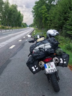Broby, Skåne län, Sweden, BMW G 650 GS Sertao enduro motorcycle on a road with bags packed for a