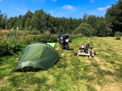 Växjö, Kronobergs län, Sweden, campsite with tent and BMW G 650 GS Sertao enduro motorcycle in a