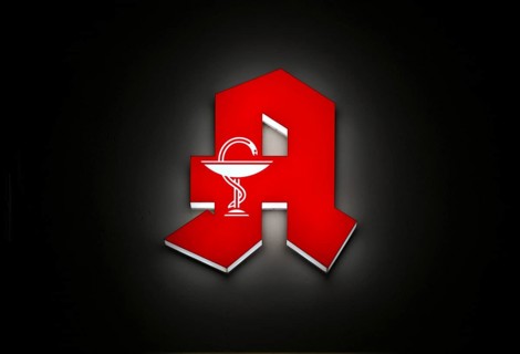 Night shot, logo, red neon sign, pharmacy sign with Aesculapian stick, Aesculapian stick,