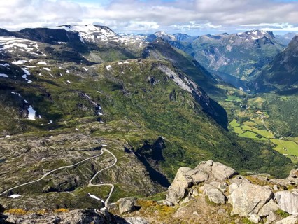 Geiranger, Møre og Romsdal province, Norway, view of a winding road in a deep, green mountain gorge