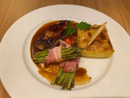 Back of lamb, potato gratin, green beans wrapped in bacon, on plate, food, Stuttgart,