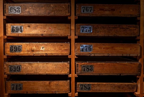 Old wooden cabinet with numbered drawers for storing match labels, Tändsticksmuseet matchstick