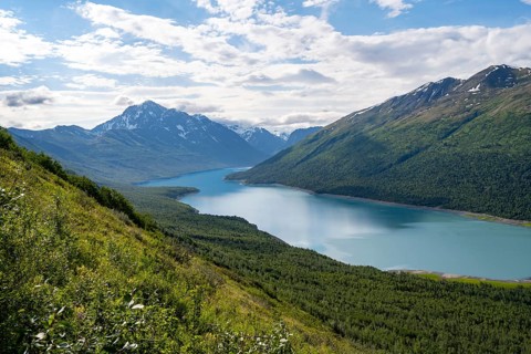 View of blue lake and mountains on Twin Peaks Trail, Eklutna Lake, Chugach Mountains, Chugach State