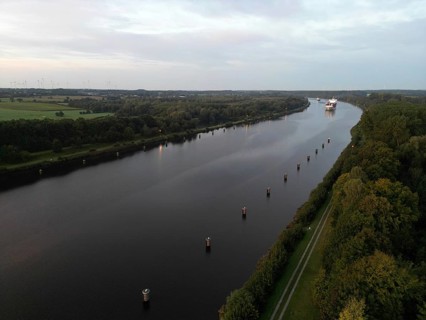 Drone shot, container ship at sunrise in the Kiel Canal, NOK, Kiel Canal, Kiel Canal,