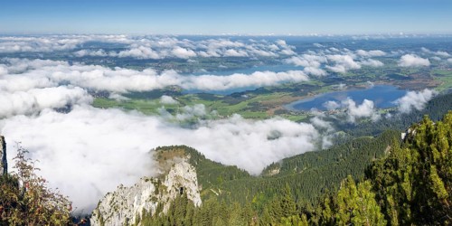 Panorama from Tegelberg, 1881m, of the cloud-covered Forggensee and Bannwaldsee, Ostallgäu,