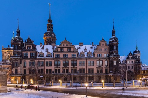 Royal Palace on a winter evening, exterior view with snow, Dresden, Saxony, Germany