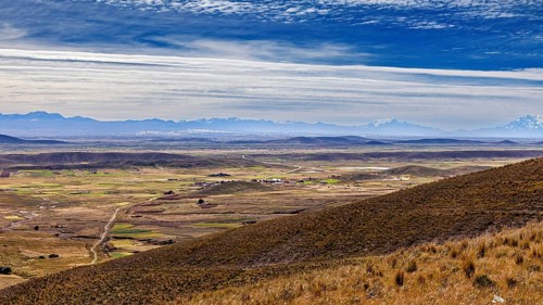 View of hilly landscape with cloudy sky, The Altiplano landscape in the Andes of Bolivia