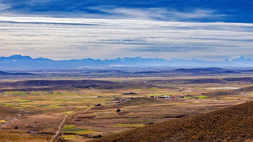 Extensive landscape with fields and mountains on the horizon, The landscape of the Altiplano in the
