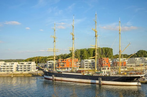 A large sailing ship the legendary 4 Mastbark Passat a flying P-liner, catches the eye in the