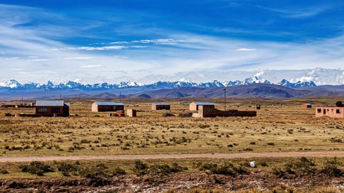 Small houses in the countryside with mountain views and blue skies, The Altiplano landscape in the