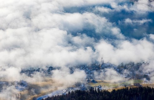 View of a sea of fog from Vormauerstein, Sankt Wolfgang am Wolfgangsee, church tower rising out of