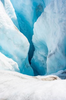Waterfall in a crevasse on the ice of Root Glacier, Wrangell St. Elias National Park, Alaska, USA