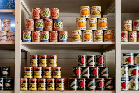 Interior view, historic restored Kennicott shopping store with historic goods display, retro food