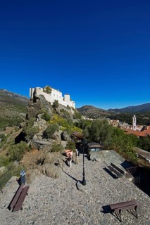 Citadel with the bastion Eagle's Nest, mountain town of Corte, on the right the village of Corte,