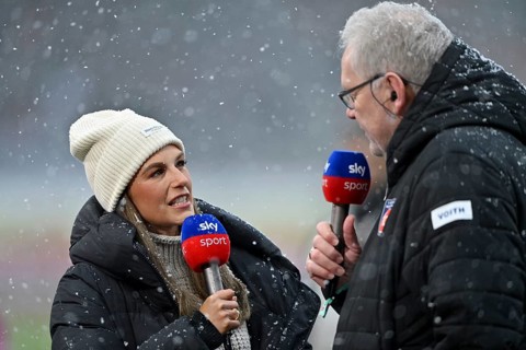 SKY reporter presenter Mara Mones wears cap in interview microphone micro logo with CEO managing