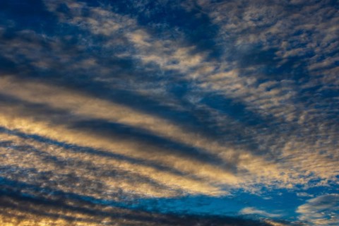 Dramatic cloudy sky, cirrus clouds at sunset, plume clouds, Austria