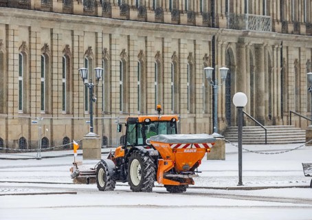 Winter in Stuttgart. There is a closed blanket of snow in the city center. Winter cleaning service