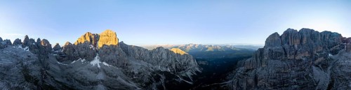 Aerial view, alpine panorama, Cima Tosa and rocky peaks at sunrise with alpine glow, picturesque